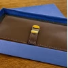 کیف پول زنانه چرم طبیعی سافتی قهوه ای